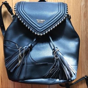 Victoria’s Secret black and gold leather backpack.